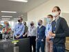 Group of executives wearing masks